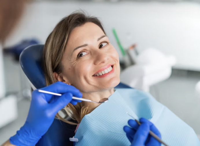 Emergency dentist team examining a patient in Louisville KY